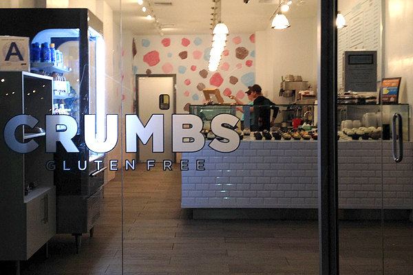 Crumbs storefront, complete with gluten-free window signage